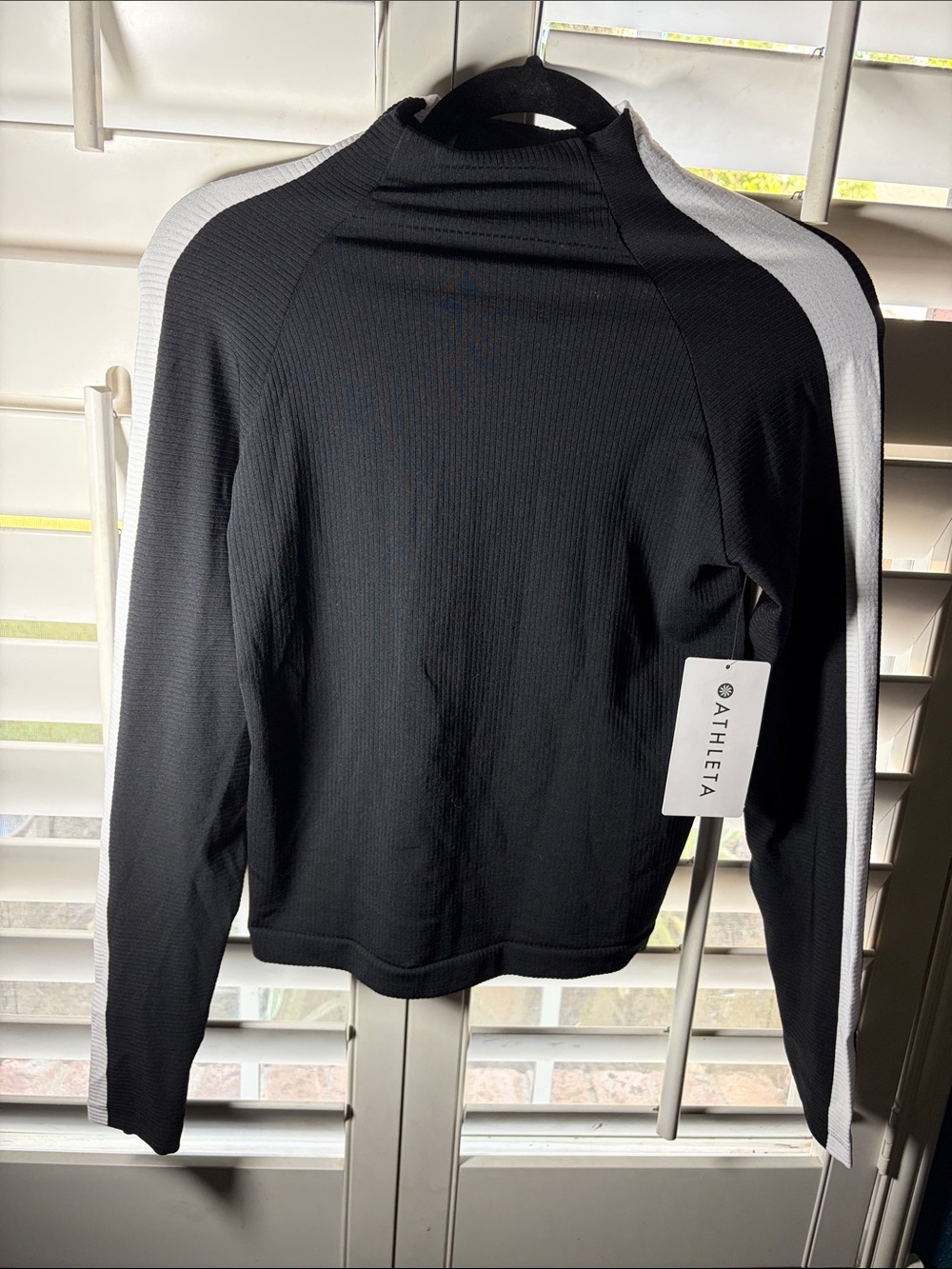 Athleta Black womens mock neck top with White Shoulder Panels